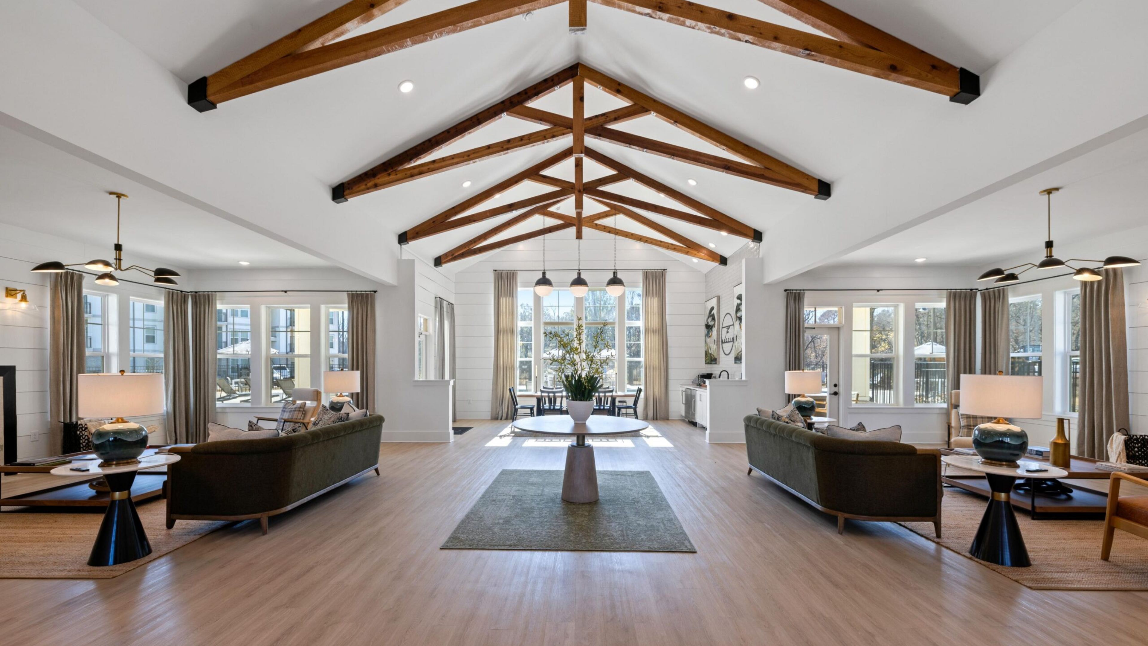 The Austin Apartment HomesThe Austin Apartment Homes Happy family having fun in the bedroom while they lie on bed