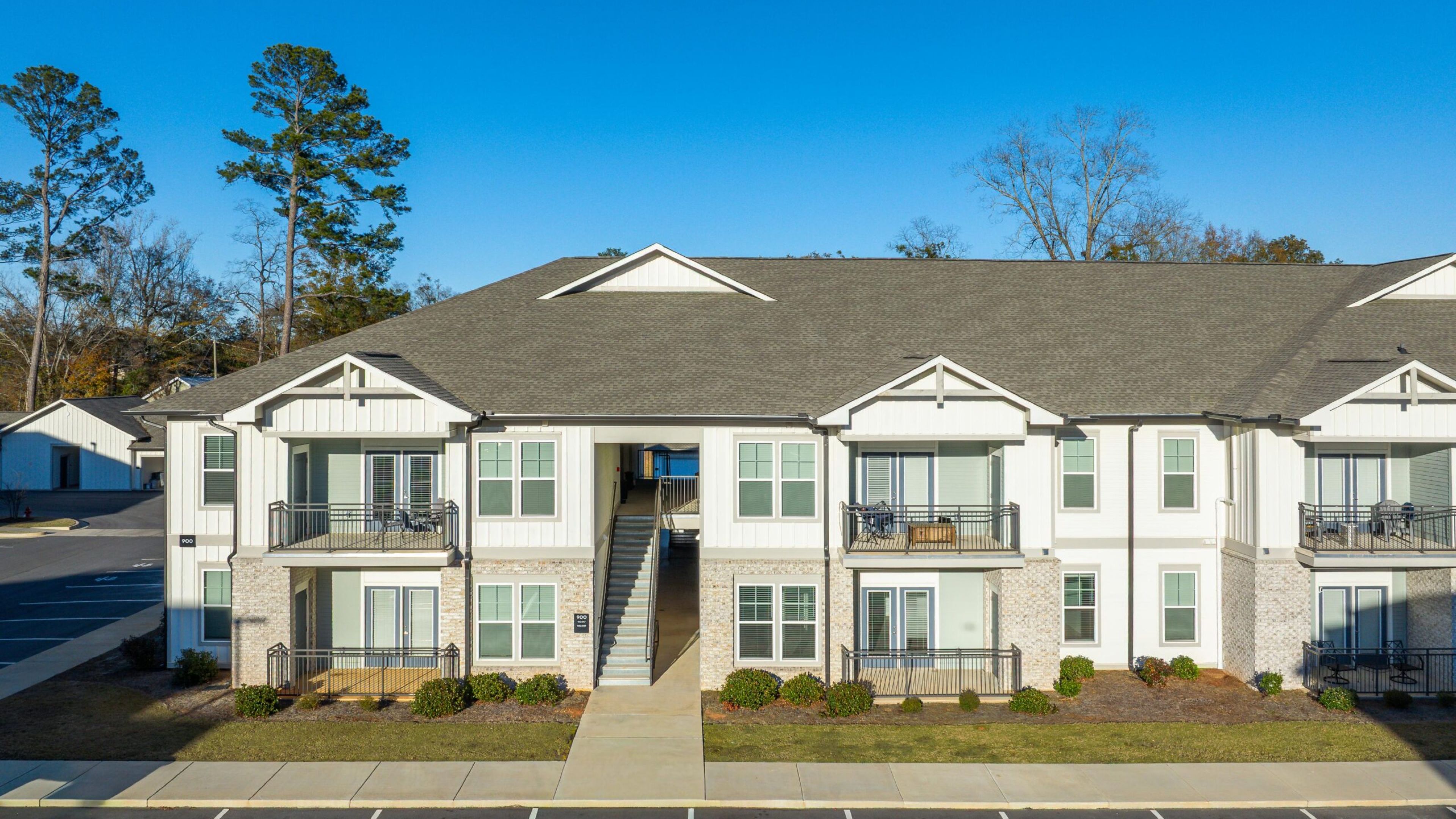 The Austin Apartment HomesThe Austin Apartment Homes Beautiful woman buying kale at a farmers market